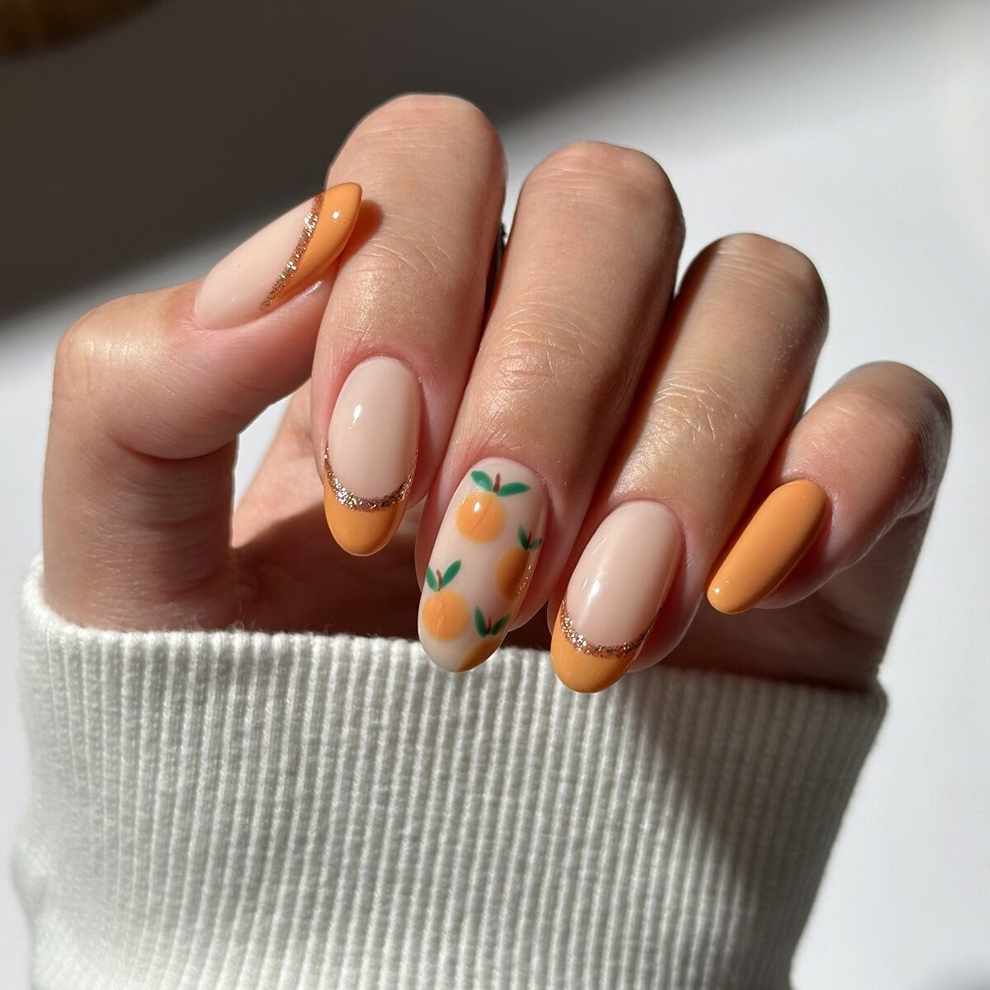 Uñas francesas de colores: naranjas